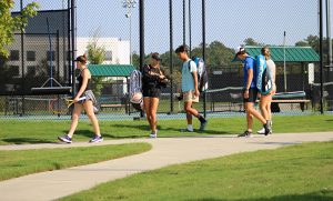 Tennis athletes walking to court