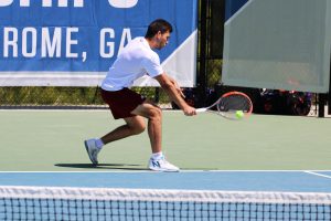 Max Motlagh, BC digs out a backhand shot in his unfinished match at No. 1 singles against Clemson